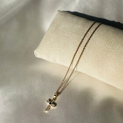 Gold necklace with a cross pendant